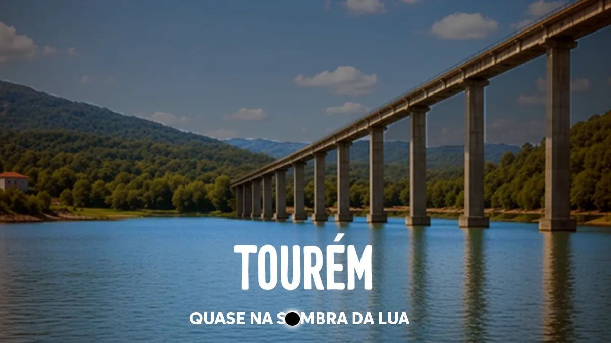 Ponte de granito sobre a albufeira de Tourém com luz escurecida e o texto Tourém quase na sombra da Lua